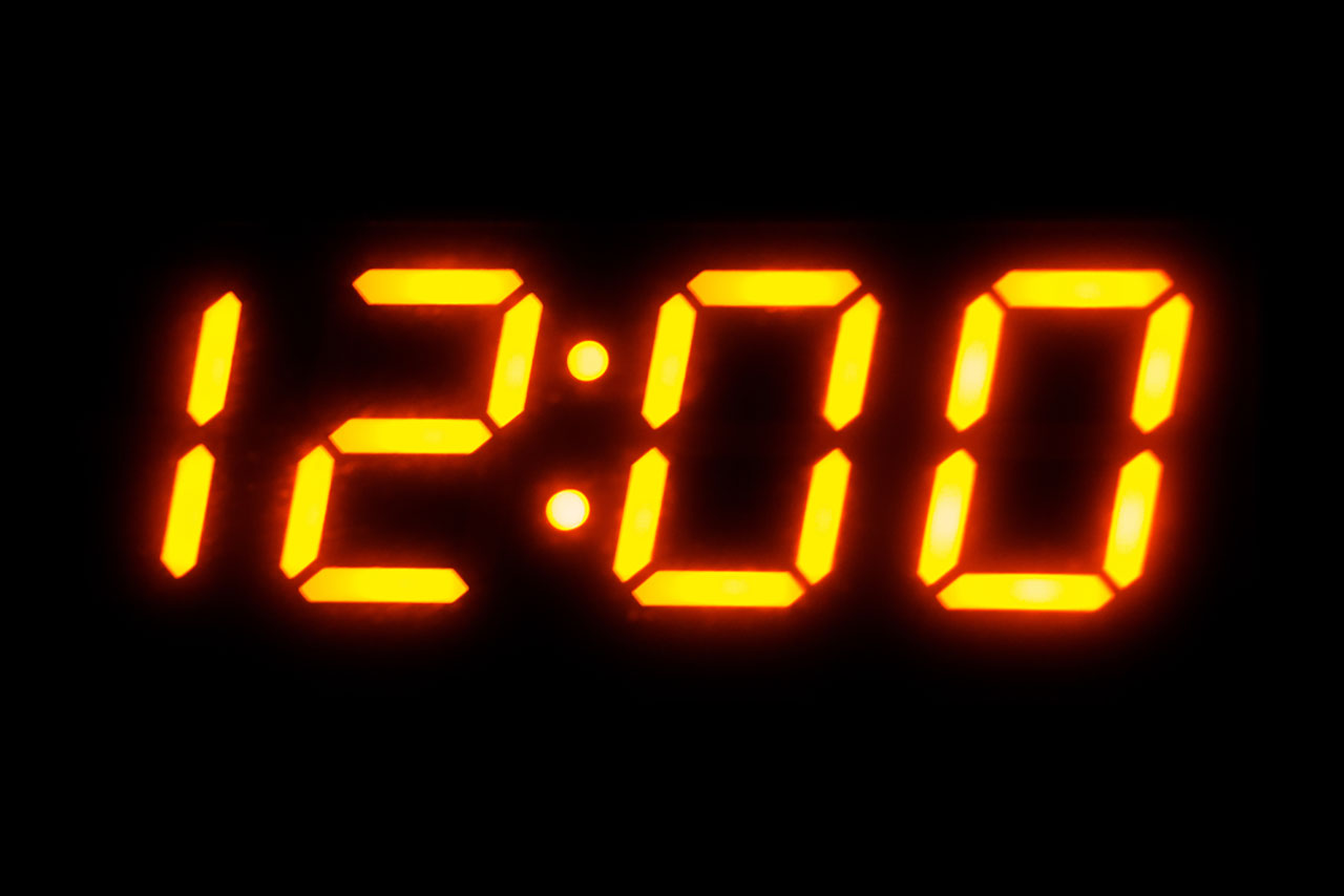 Digital clock displaying midnight